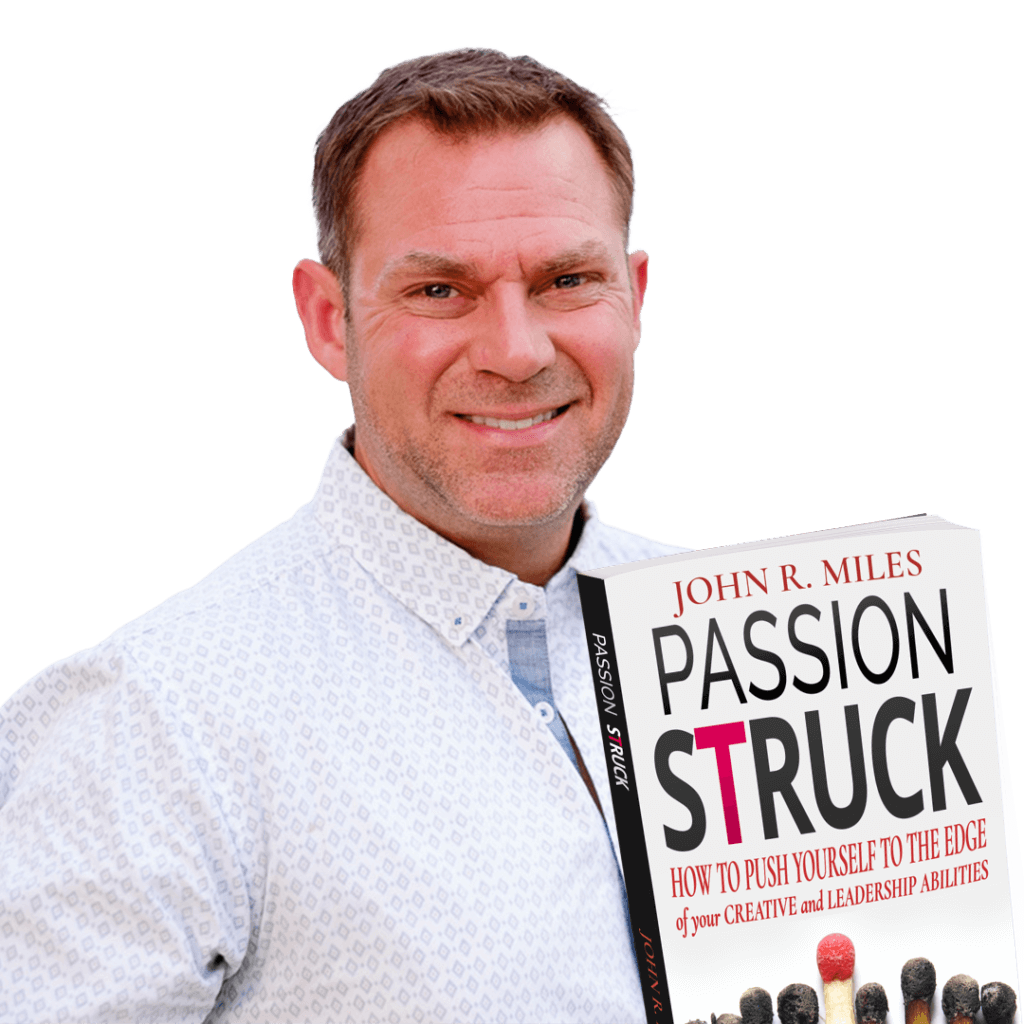 John R. Miles Holding Passion Struck book