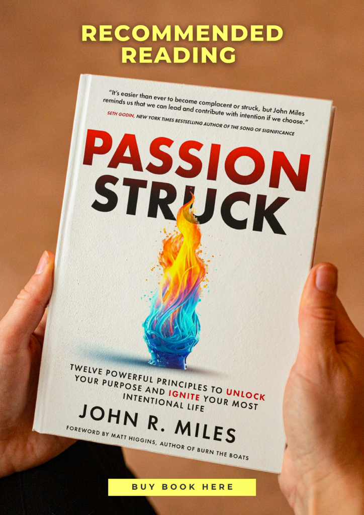 Passion Struck by John R. Miles book being held in hands